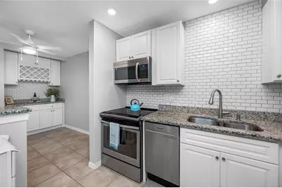 3295 Fox Chase #105, Palm Harbor, FL 34683 - Photo 2