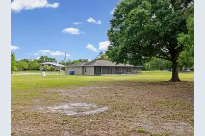 31706 Hunt Club Lane, Wesley Chapel, FL 33543 - Photo 32
