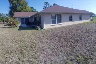 706 Canterbury Cir, Lehigh Acres, FL 33974 - Photo 2