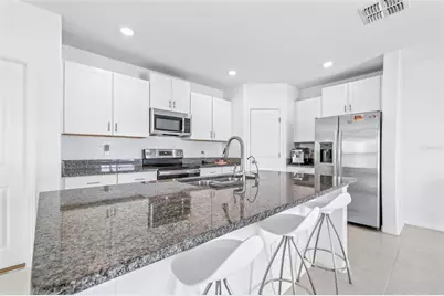 31366 Barrel Wave Way, Wesley Chapel, FL 33545 - Photo 16