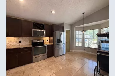 10334 Lecon Branch Court, Orlando, FL 32825 - Photo 6