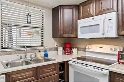 1319 Abbey Crescent Lane, Clearwater, FL 33759 - Photo 12
