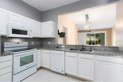 3326 Covered Bridge Drive W, Dunedin, FL 34698 - Photo 10