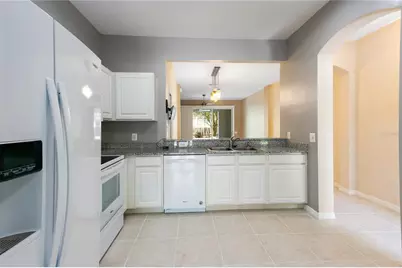3326 Covered Bridge Drive W, Dunedin, FL 34698 - Photo 6