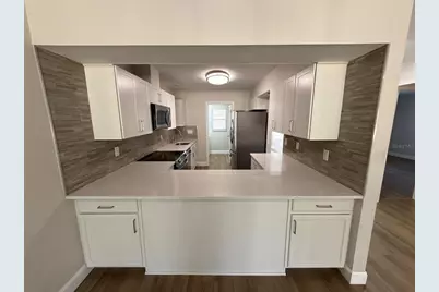 3505 Tarpon Woods Boulevard #J408, Palm Harbor, FL 34685 - Photo 10