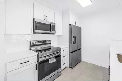 10375 Paradise Boulevard #51, Treasure Island, FL 33706 - Photo 12