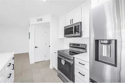 10375 Paradise Boulevard #51, Treasure Island, FL 33706 - Photo 16