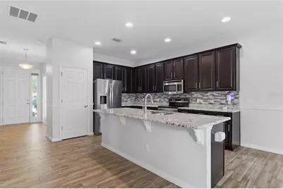 32659 Harmony Oaks Drive, Wesley Chapel, FL 33545 - Photo 8