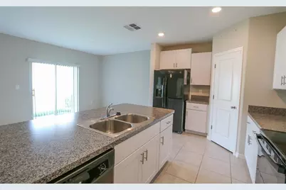 3715 Daisy Bloom Place, Tampa, FL 33619 - Photo 6