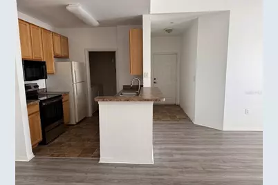 10205 Courtney Palms Boulevard #303, Tampa, FL 33619 - Photo 8