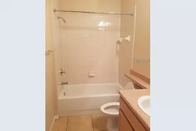 10205 Courtney Palms Boulevard #303, Tampa, FL 33619 - Photo 12