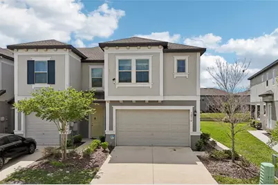 32010 Blue Passing Loop, Wesley Chapel, FL 33545 - Photo 1