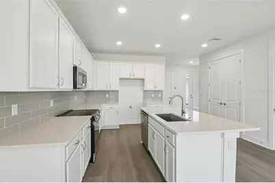 31844 Clover Fin Court, Wesley Chapel, FL 33545 - Photo 12
