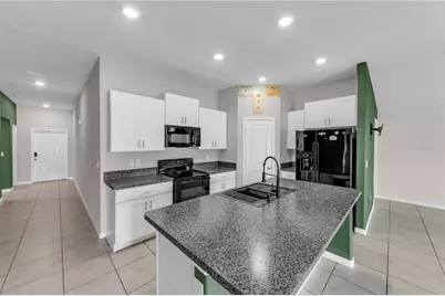 6765 Emerald Spring Loop, New Port Richey, FL 34653 - Photo 20