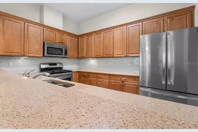 2128 Sifield Greens Way #13, Sun City Center, FL 33573 - Photo 18