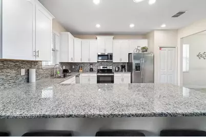 9045 Hazard Street, Champions Gate, FL 33896 - Photo 12