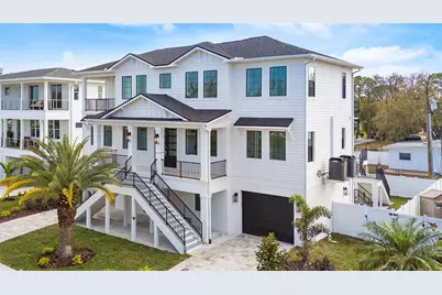 220 90th Avenue NE, Saint Petersburg, FL 33702 - Photo 1