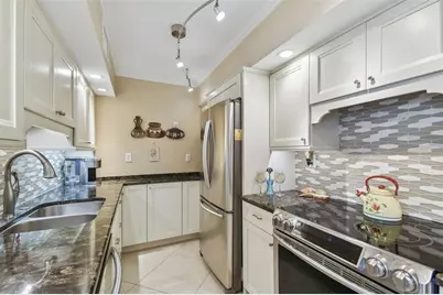 10355 Paradise Boulevard #702, Treasure Island, FL 33706 - Photo 26