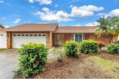 9212 Rustic Pines Boulevard W, Seminole, FL 33776 - Photo 1