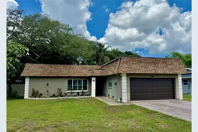 1011 Winding Oaks Drive, Palm Harbor, FL 34683 - Photo 1