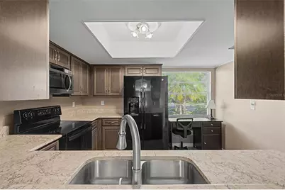 1905 Hanson Court #305, Sun City Center, FL 33573 - Photo 30