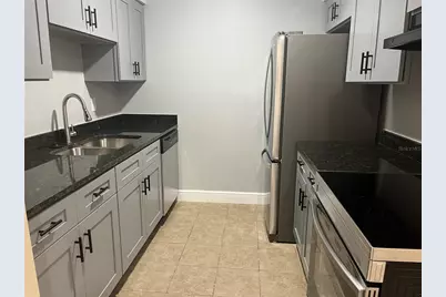 9105 Tudor Drive #F103, Tampa, FL 33615 - Photo 6
