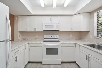 1910 W Sligh Avenue #E102, Tampa, FL 33604 - Photo 8