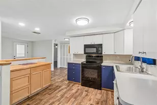 1056 Tamarac Dr, Holiday, FL 34690 - Photo 14
