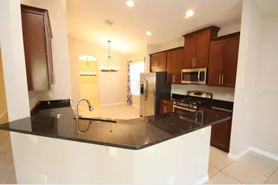 8827 Sentiero Drive, Land O Lakes, FL 34637 - Photo 12