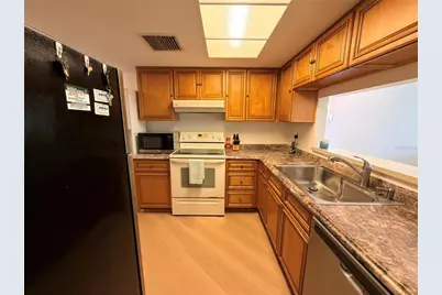 9703 Greenskeeper Drive, New Port Richey, FL 34655 - Photo 6