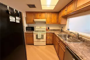 9703 Greenskeeper Dr, New Port Richey, FL 34655 - Photo 6