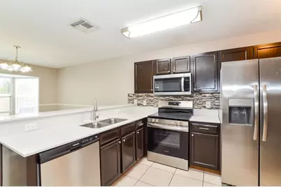 6730 Brittany Chase Court, Orlando, FL 32810 - Photo 12