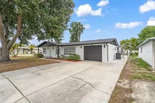 3325 Darlington Rd, Holiday, FL 34691 - Photo 4