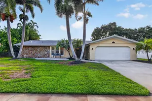 6390 Burning Tree Dr, Seminole, FL 33777 - Photo 1