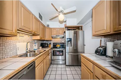 10365 Paradise Boulevard #16, Treasure Island, FL 33706 - Photo 16
