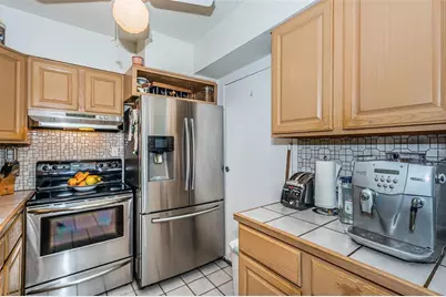 10365 Paradise Boulevard #16, Treasure Island, FL 33706 - Photo 18