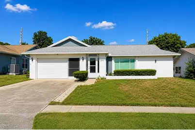 2942 Macalpin Drive W, Palm Harbor, FL 34684 - Photo 1