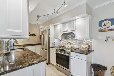10355 Paradise Boulevard #702, Treasure Island, FL 33706 - Photo 14