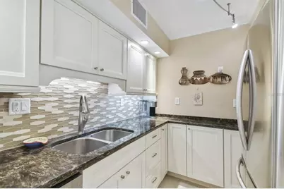 10355 Paradise Boulevard #702, Treasure Island, FL 33706 - Photo 16