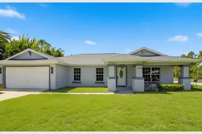 1104 Morton Street E, Lehigh Acres, FL 33974 - Photo 1
