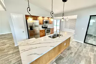 2991 Valencia Ln E, Palm Harbor, FL 34684 - Photo 6