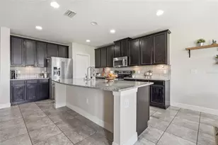10229 Newminster Loop, Ruskin, FL 33573 - Photo 14