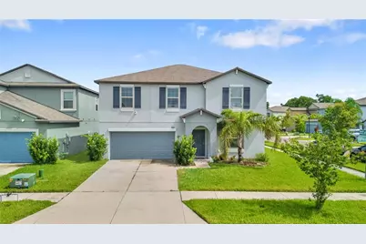 7420 Pearly Everlasting Avenue, Tampa, FL 33619 - Photo 2