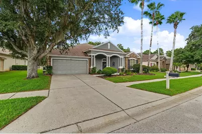 7504 Whispering Wind Drive, Land O Lakes, FL 34637 - Photo 6