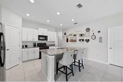 39745 Harvest Creek Lane, Zephyrhills, FL 33540 - Photo 12