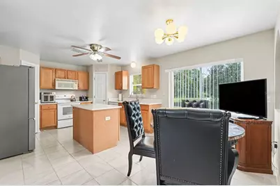 30346 Rattana Court, Wesley Chapel, FL 33545 - Photo 12