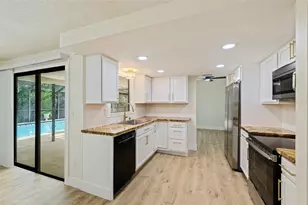 1671 Castlewood Ln, Palm Harbor, FL 34683 - Photo 4