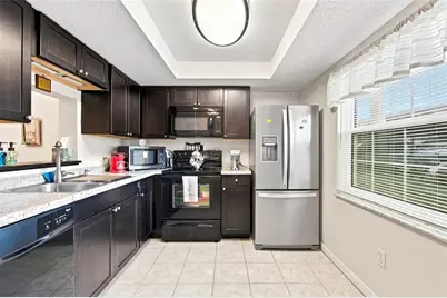 1370 Heather Ridge Boulevard #104, Dunedin, FL 34698 - Photo 6