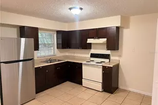 9406 N Hartts Dr, Tampa, FL 33617 - Photo 12