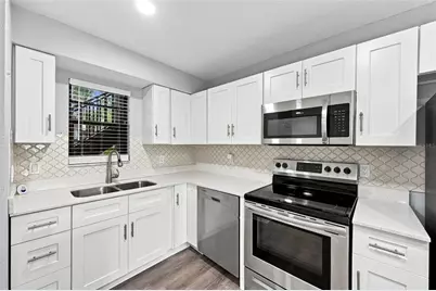 1000 Tarpon Woods Boulevard #302, Palm Harbor, FL 34685 - Photo 12
